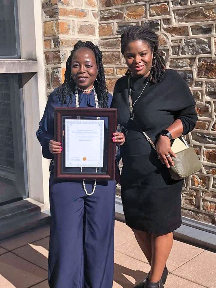 Ruby Thompkins, left, and her goddaughter, Dr. Blair Kelley, assistant dean for Interdisciplinary Studies and International Program at N.C. State, celebrate Thompkins' Duke University Chapel Humanitarian Award. Photo courtesy of Ruby Thompkins.