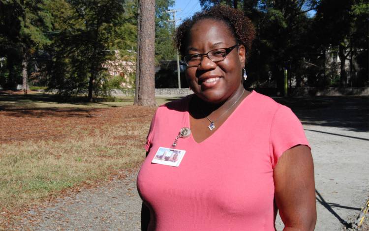 The Academic Resource Center's Sonya Jones finds that a quick morning walk helps her focus. Photo by Stephen Schramm.