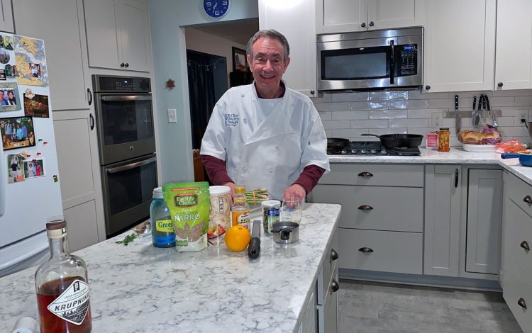 In his kitchen, Stan Paskoff can let go of the stress of working on the computer all day and relax cooking a meal. Photo courtesy of Stan Paskoff.