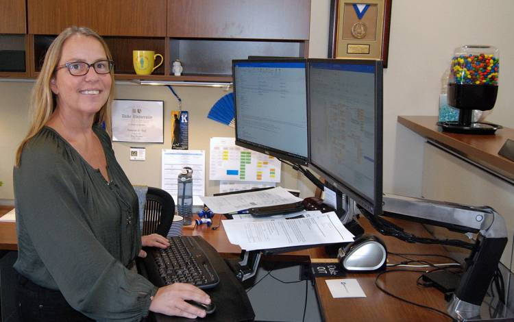 A special assistant in Duke Neurosurgery, Tami Tuck manages the schedules of department leaders. Photo by Stephen Schramm.