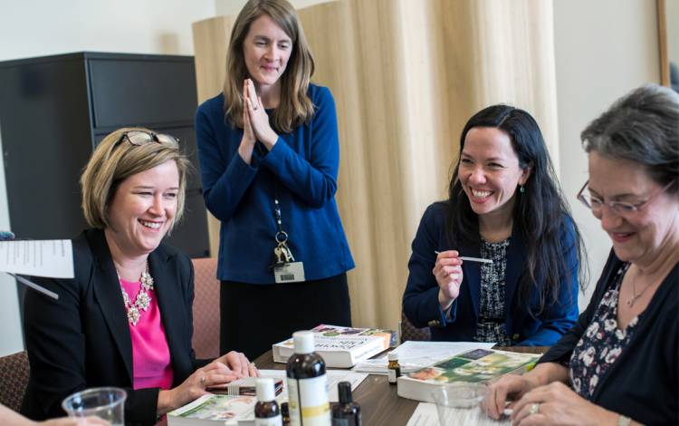 Catherine Liao, second from right, participants in an essential oils demonstration at a WeLEAD event at Duke Integrative Medicine.