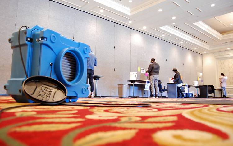 Air scrubbers such as these at the Washington Duke Inn & Golf Club are among the safety enhancements for Duke's 15 on-campus surveillance testing locations. Photo by Stephen Schramm.