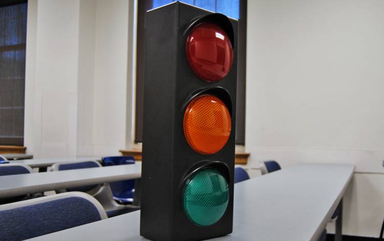 Stop light on a table.