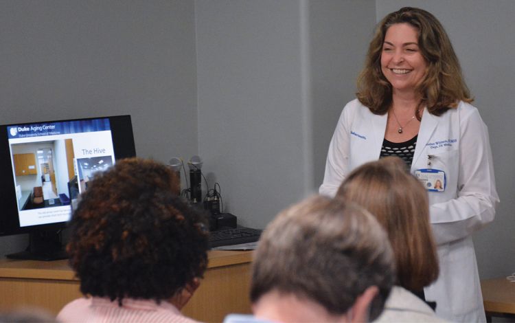Dr. Heather Whitson, director of the Duke Aging Center, speaks during last month's celebration. Photo by Stephen Schramm.