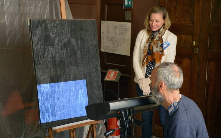 Kristin Huffman, standing, works with Andrea Giordano, a colleague from the University of Padua, to use a laser scanner. Photo courtesy of Kristin Huffman.