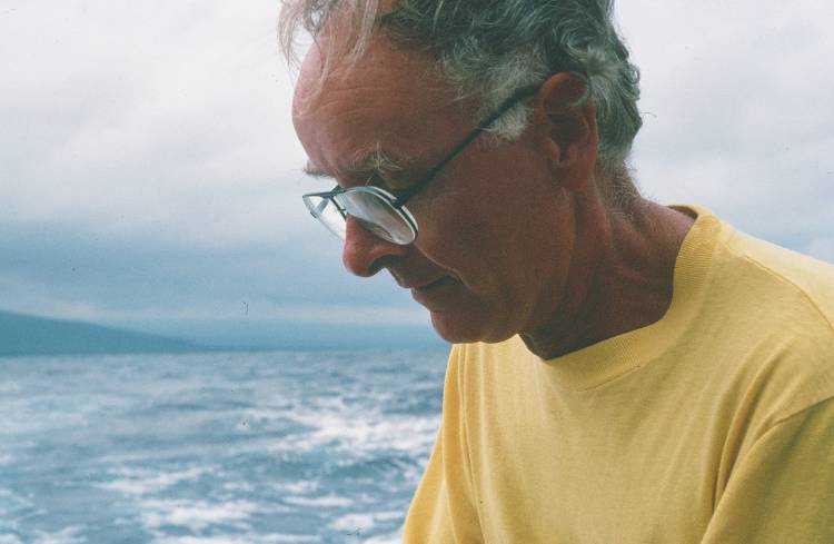 Wainwright sitting on a boat off the coast of Hawaii in the late 1980s, part of an expedition to get underwater footage of blue marlin. Photo courtesy of John Long, Vassar College
