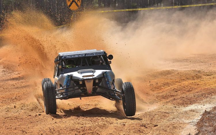 Amy Feistel, seen here navigating during a race, stays fit so she can participate in rally car events. Photo courtesy of Amy Feistel.