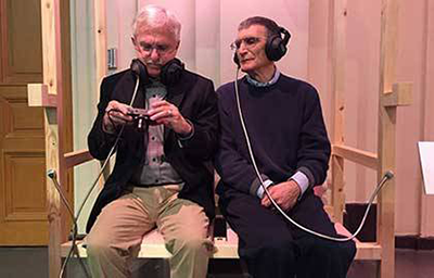 Paul Modrich and Aziz Sancar prepare for an interview during Nobel Prize week in Sweden.