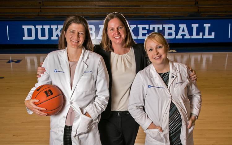 From left to right, Georgia Beasley, Lauren Rice and Krista Gingrich, have remained tight nearly two decades after their Duke basketball careers ended. Photo by Chris Hildreth.