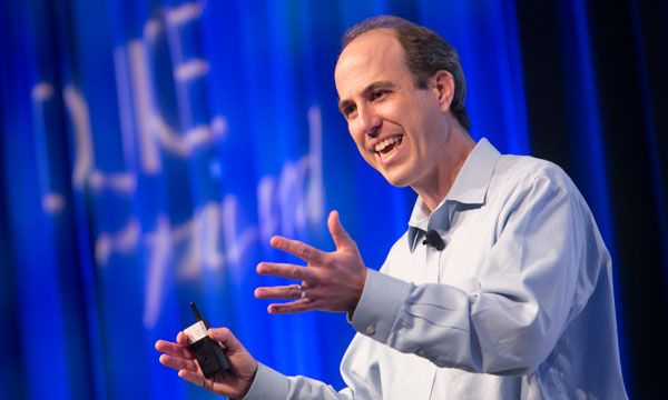 David McAdams talking on stage