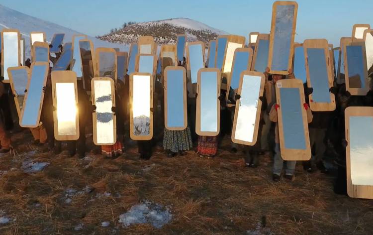 Mirror Shield Project. Conceived by artist Cannupa Hanska Luger. Drone image still by Rory Wakemup. Oceti Sakowin Camp, 2016. 