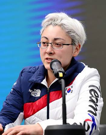 Randi Griffin speaks to the media during the Winter Olympics. Photo courtesy of Korean Ice Hockey Association.