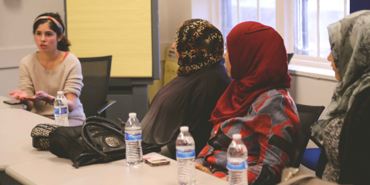 Duke students meet with local refugees.