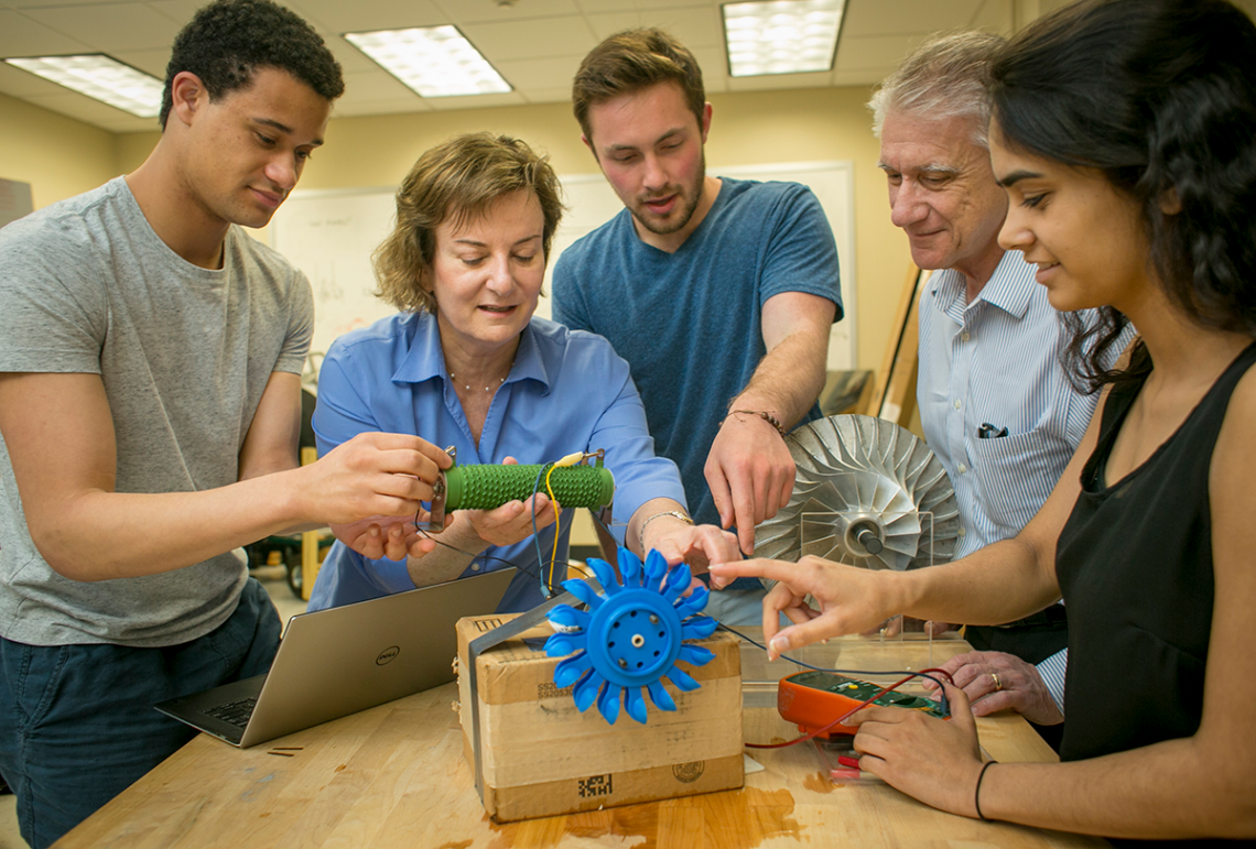 Emily Klein, professor of earth and ocean sciences, and Josiah Knight, associate professor of mechanical engineering and materials science, work with students from the Bass Connections project team “Energy andthe Environment: Design and Innovation.”