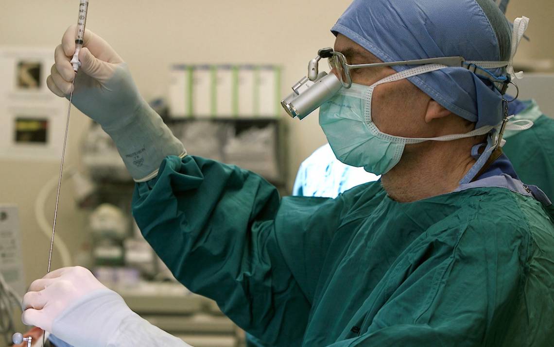 Dr. Alan Friedman performs a glioblastoma biopsy at Duke University Hospital.