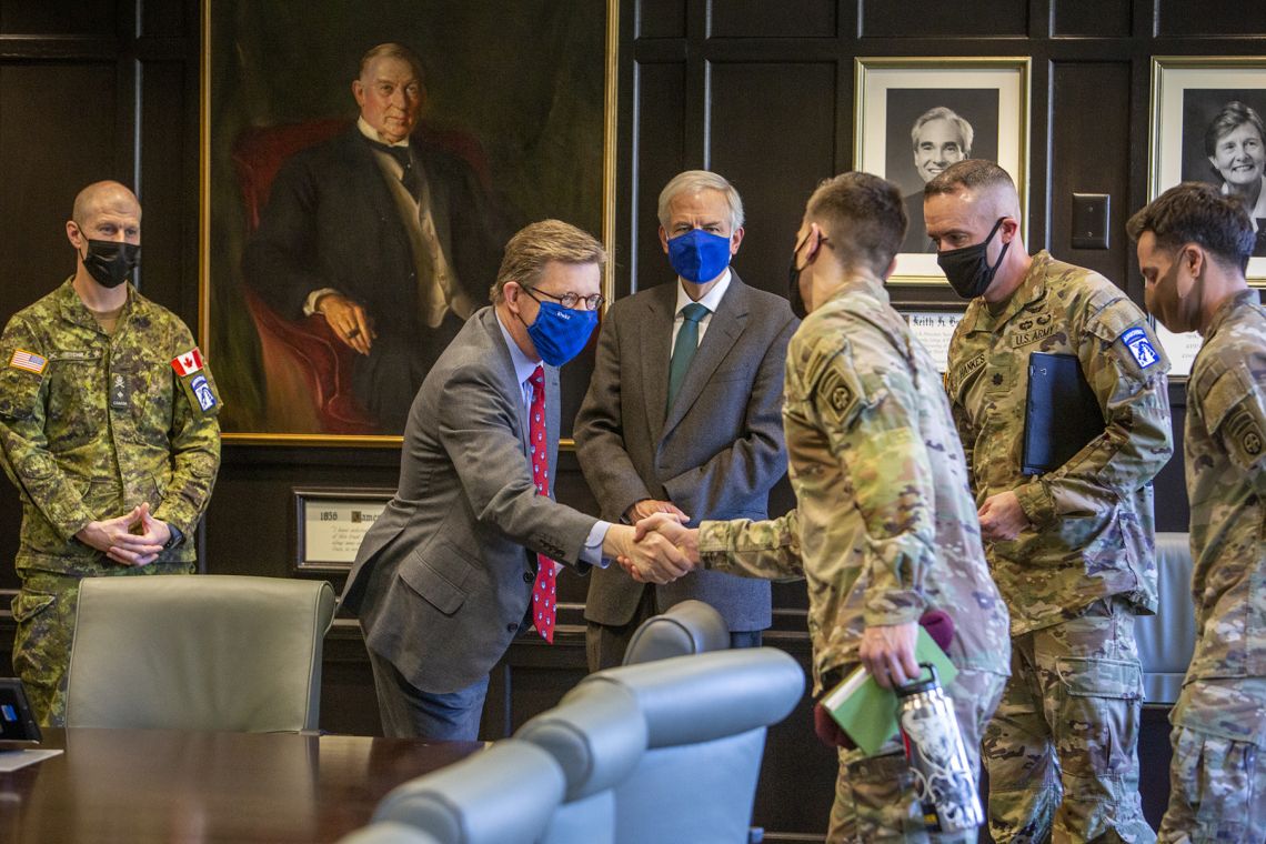 Duke President Vincent Price meets with innovation leaders from the XVIII Airborne Corps and 82nd Airborne Division before signing an Educational Partnership Agreement.