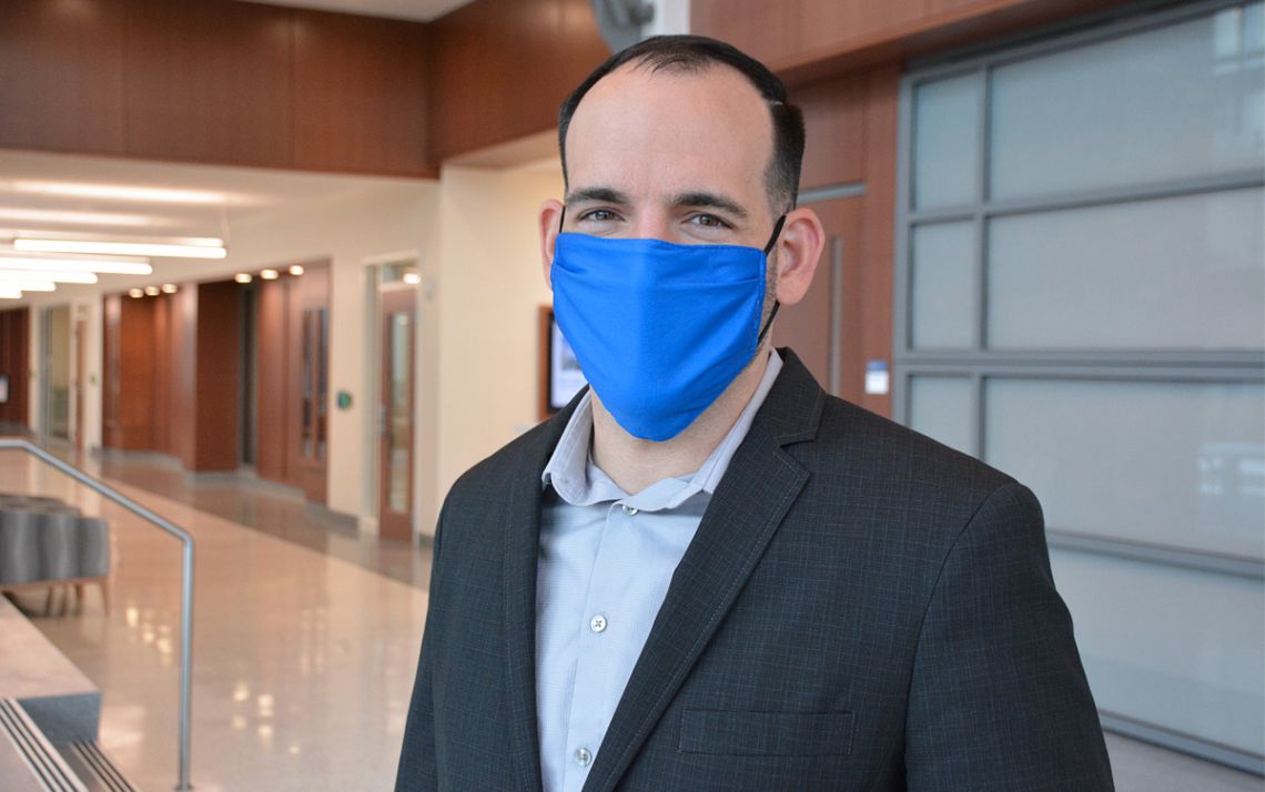 The Duke University School of Nursing's Brandon Knettel researches ways to help the mental health of patients facing serious physical hurdles. Photo by Stephen Schramm.