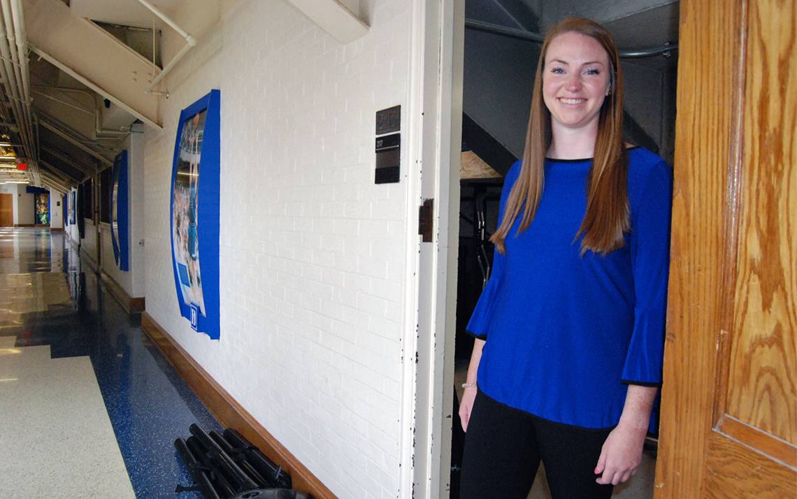 Mikaela Ryan, assistant director of game operations and championships for Duke Athletics, is familiar with the hidden corners of Cameron Indoor Stadium. Photo by Stephen Schramm.