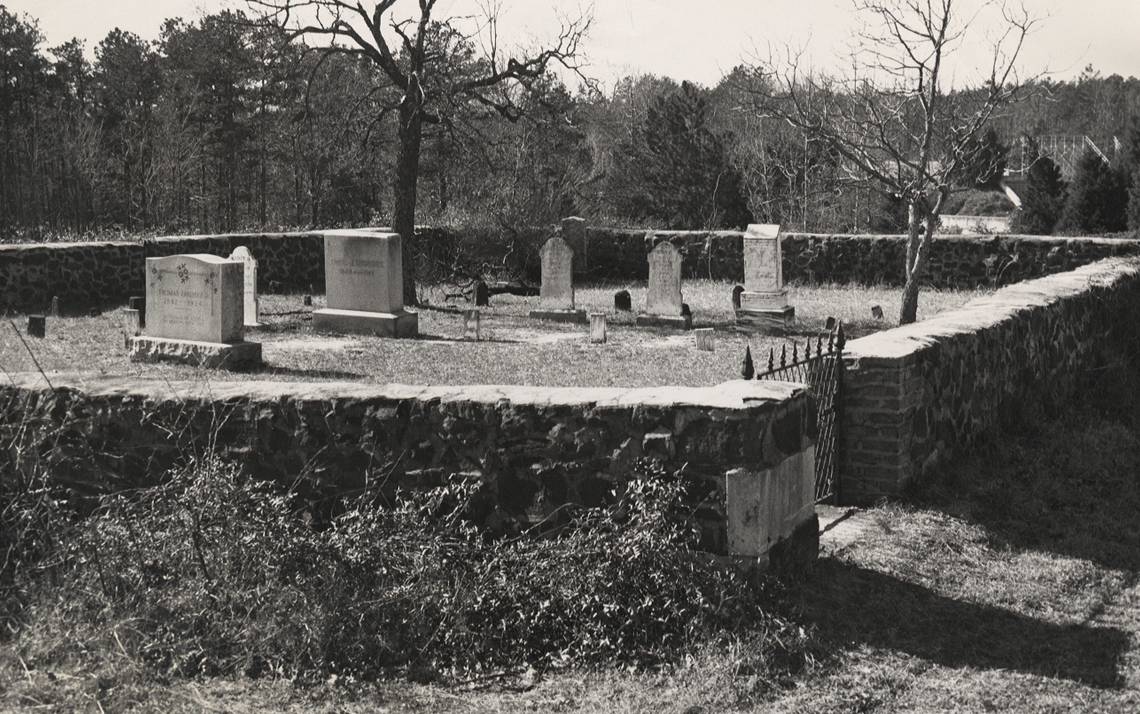 About 17 gravestones dot the quarter acre of land set aside for the Rigsbee Graveyard on Duke’s West Campus. Photo courtesy of Duke University Archives.