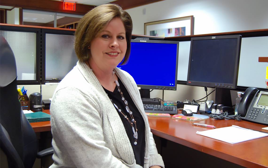 Corrine Starke at her desk.