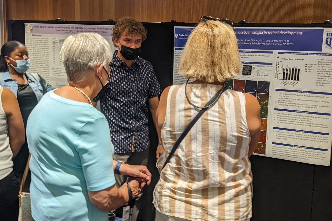 Summer neuroscience student Dillon presented his findings in a scientific poster session. 