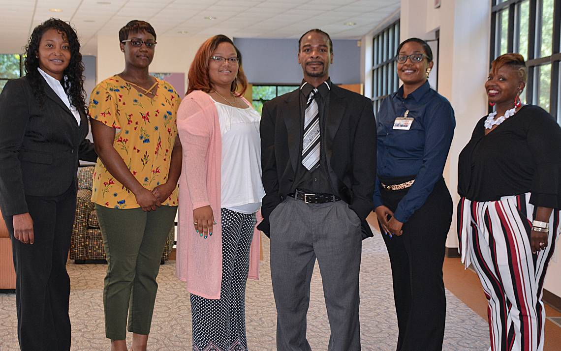 (Left to right) Gina Rogers, practitioner with Duke Learning & Organization Development, with Foundational Skills participants LaShaunda Freeman, Nicole Smith, George Johnson, Lamecka Wilkerson and Marquita Mangum.