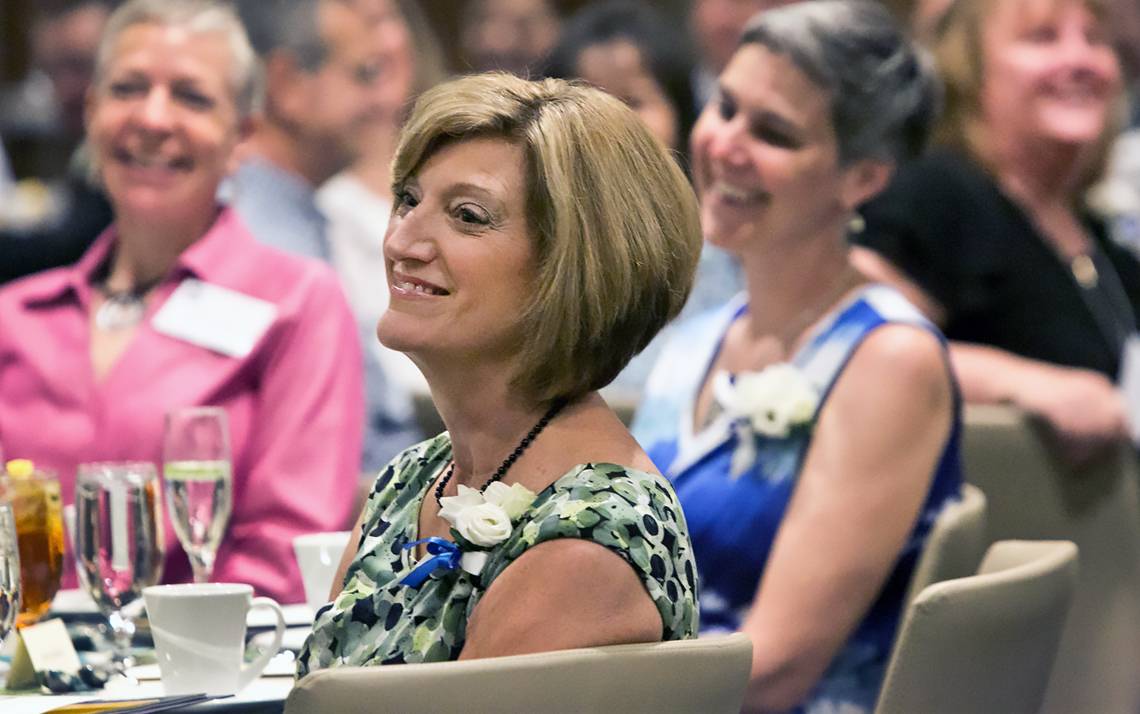 Guests and honorees watch the presentation of the 2016 Presidential Awards.