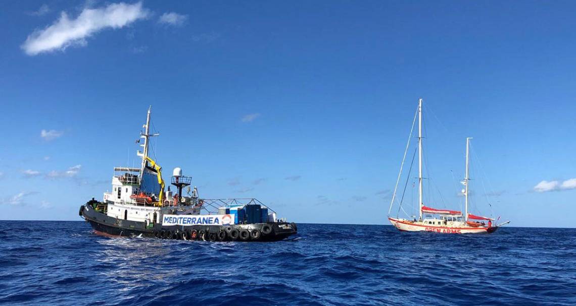 The Mare Jonio, left, has taken to sea in search of refugees in need.