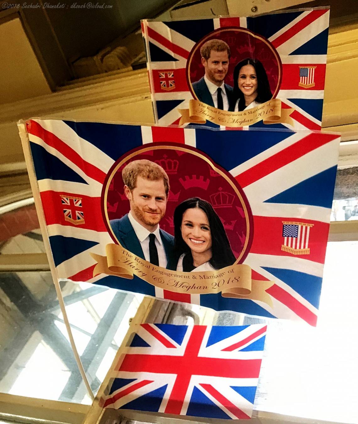 Wedding celebration decorations picturing Meghan Markle and Prince Harry, photographed at Clapham Junction station in London, England.
