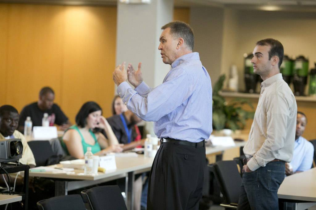 Jon Fjeld, center, addresses a Fuqua entrepreneurship workshop. Photo by Howie Rhee