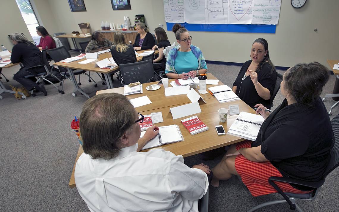 A group takes part in a session of the Crucial Conversations course offered by Duke Learning & Organization Development.