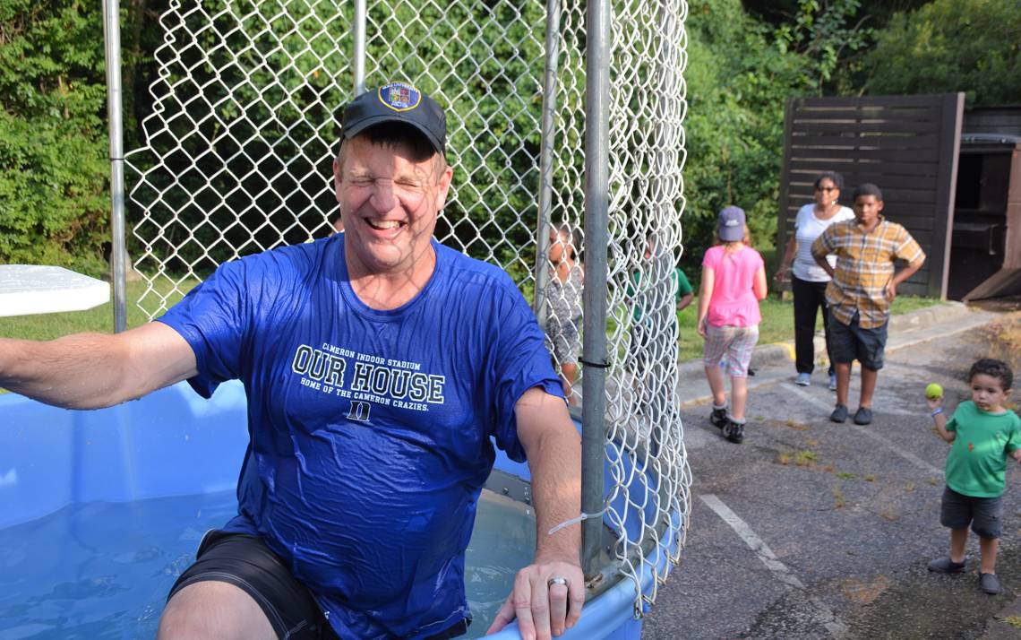 Duke Police Assistant Chief James Bjurstrom takes a dip in the dunk tank. 