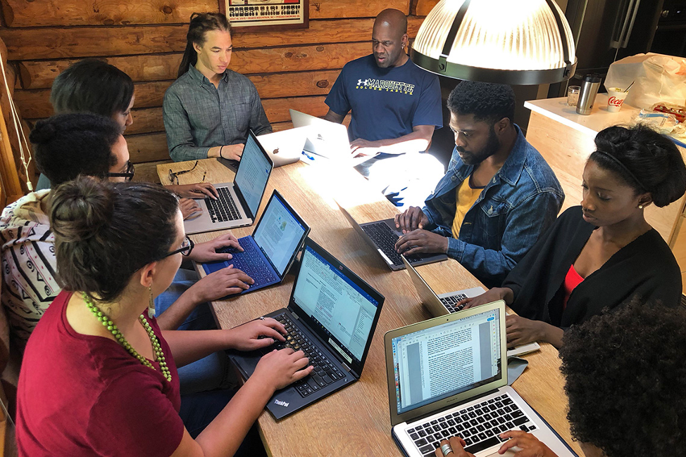 Members of the Writing and ReseArch Productivity (WRAP) Group for Underrepresented Faculty take part in a writing retreat. (From left: Sarah Gaither, Gustavo Silva, Sherilynn Black, Tyson Brown, Robert Turner, Jarvis McInnis, Sally Nuamah, Jean Beaman)