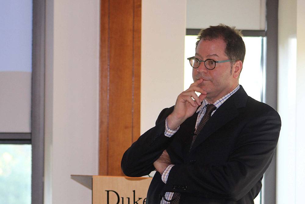 Seth Pollak takes a question during his discussion of poverty and childhood brain development.