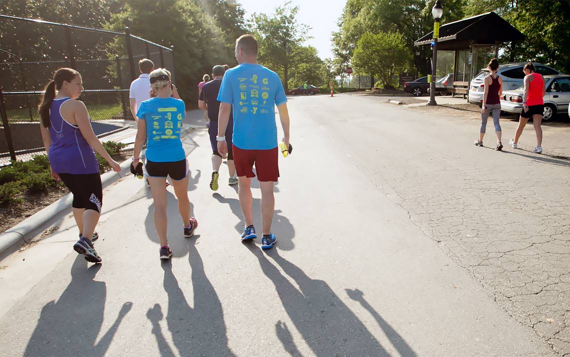 Duke employees walk together during a Run/Walk Club meetup.