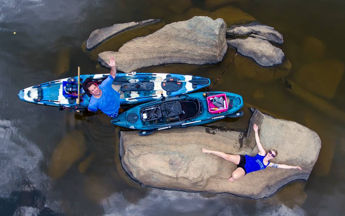 Samantha Shaltz and her husband Brad enjoy a kayak trip on Falls Lake.