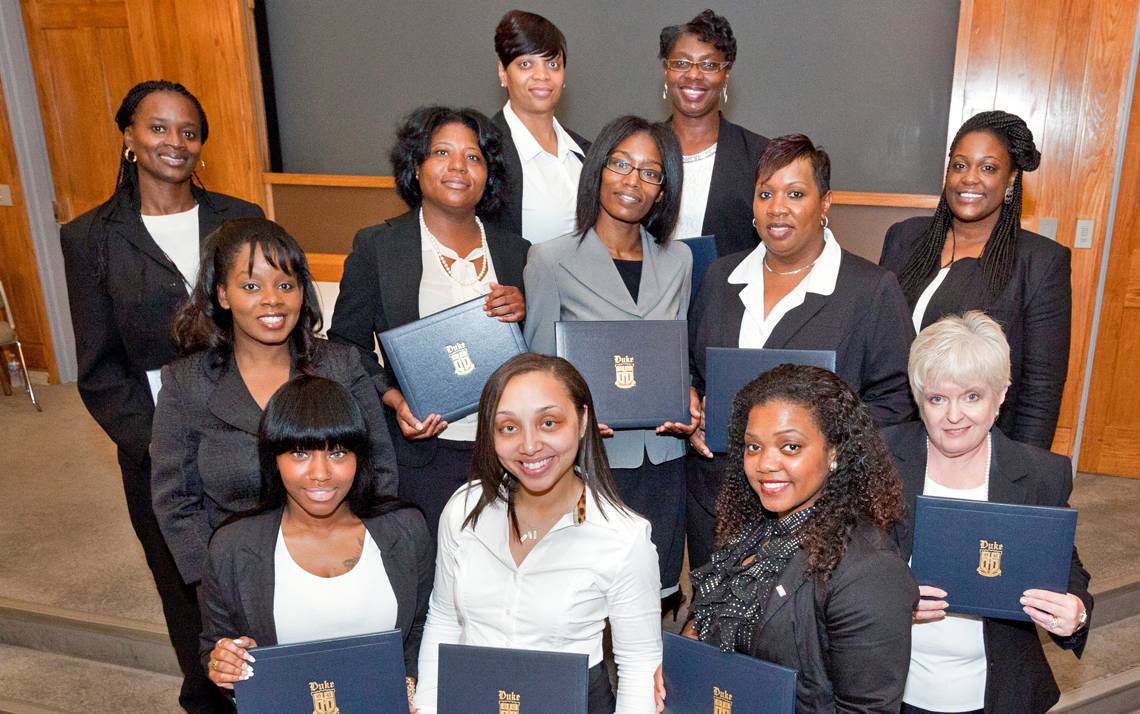 The eighth graduating class of the Professional Development Institute's Office Staff Development Program in 2014. Photo by Duke Photography.