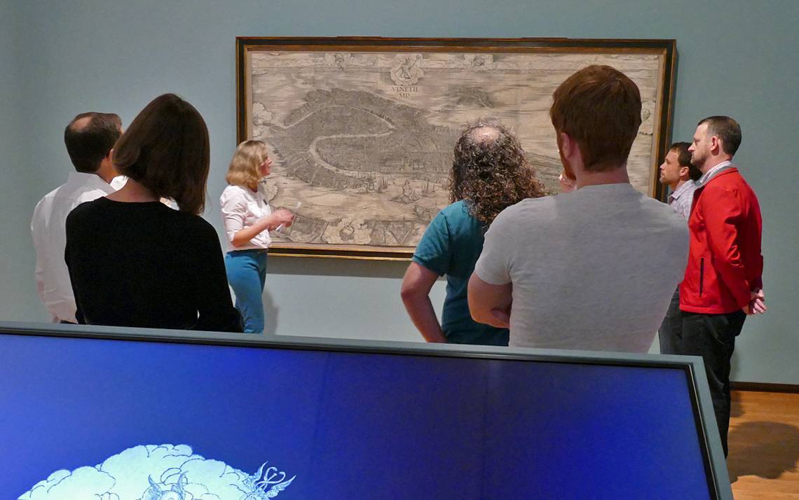 Kristin Huffman, center, discusses Jacopo de’ Barbari’s View, which depicts Venice around 1500.