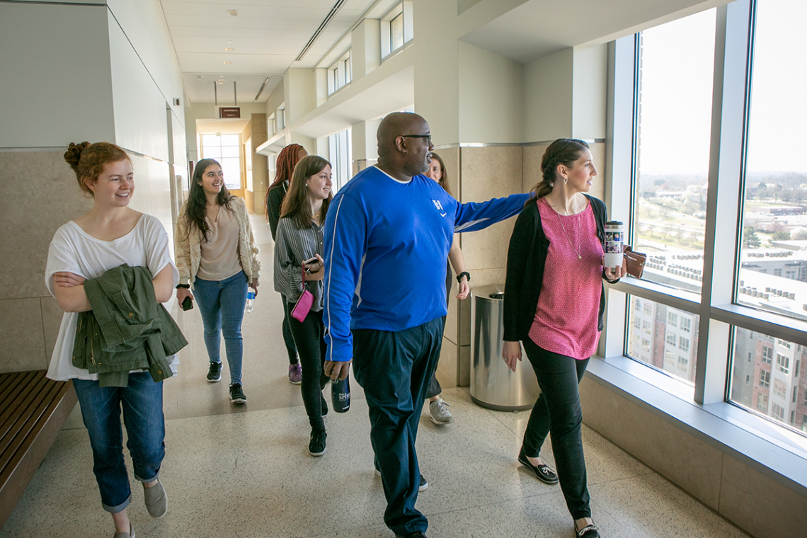 John Blackshear leads students on a tour as part of his SpringBreakthrough class on forensic psychology.