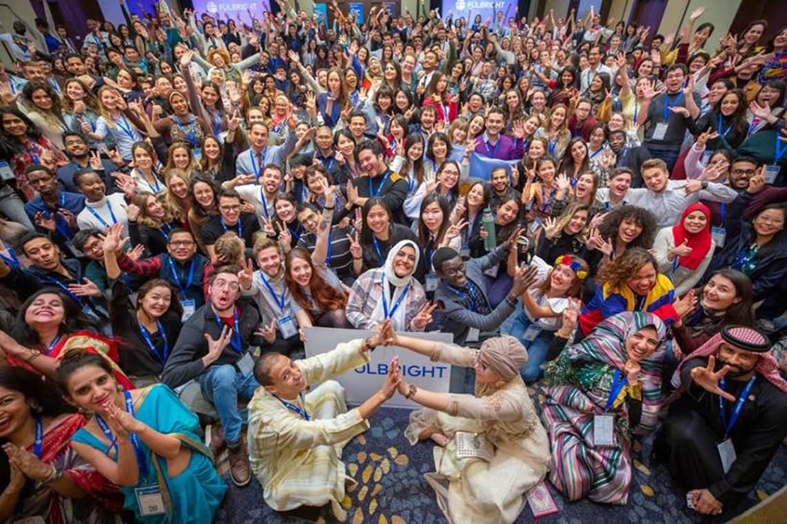 Fulbright students together at a pre-pandemic conference.