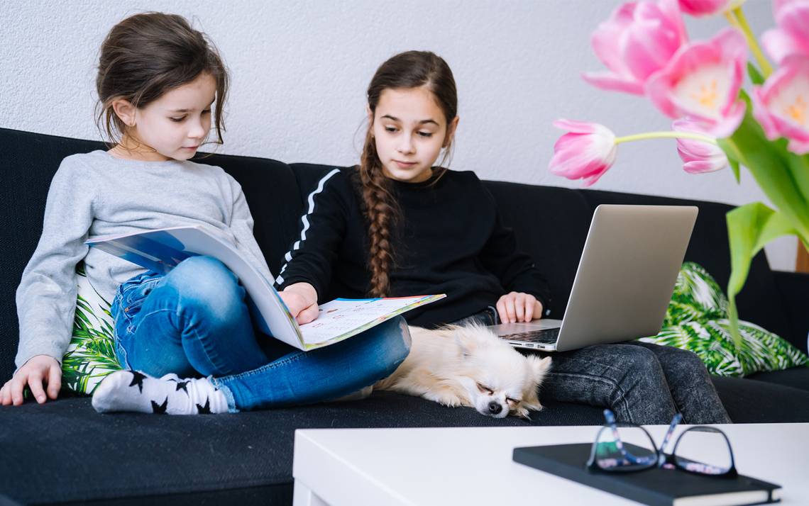 Kids sitting on a couch.