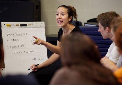 Physical theater performer Kali Quinn talks with Duke students during a recent workshop on campus.
