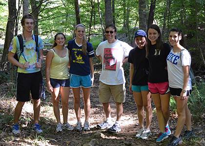 Simon Partner, center, on a field trip to Duke Forest with students from Alspaugh Domitory, where he lives as faculty-in-residence. Photo courtesy of Simon Partner.