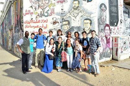 Mbaye Lo, left, with DukeEngage students this past summer in Cairo.