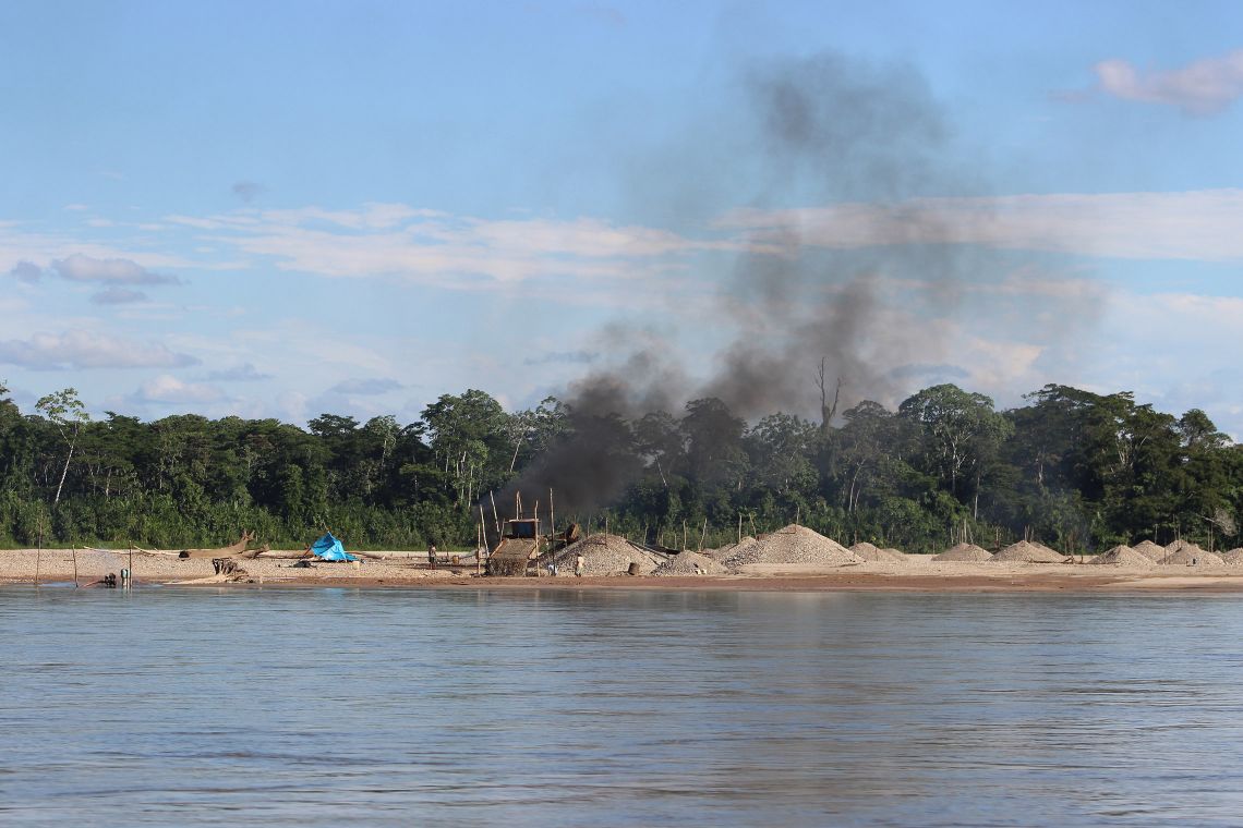 Illegal gold miners use mercury to bind gold particles, then separate the two metals by burning gold-mercury pellets in open fire ovens, releasing clouds of highly toxic mercury particles into the atmosphere. Credit – Melissa Marchese