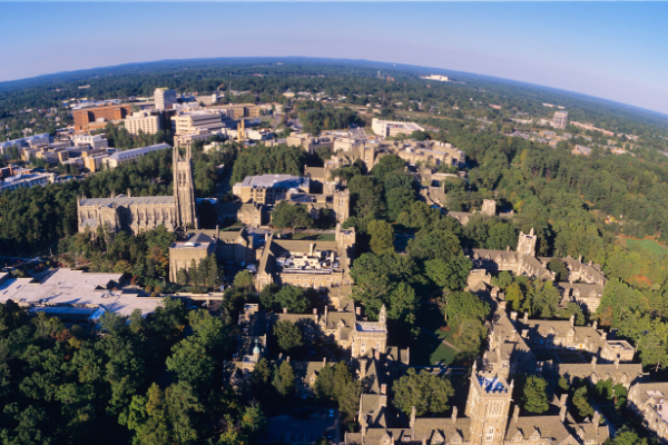 Wide aerial of Duke campus, centered on Duke Chapel and West Campus