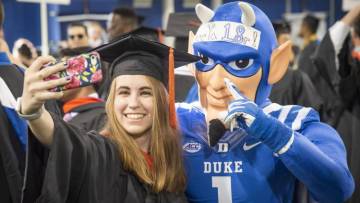 The Blue Devil and a Class of 2018 member take a selfie together