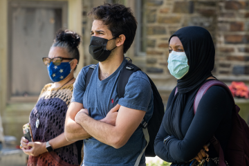 Members of the Duke community listen at Wednesday's vigil remembering George Floyd and other victims of police violence. Photo by Bill Snead