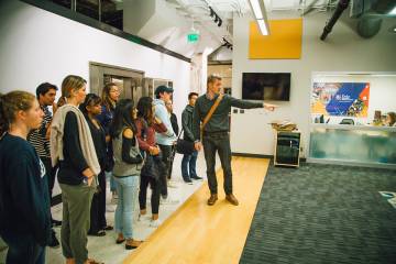 Students in Dennis Clements' global health class visit local entrepreneurs in Durham's American Underground.