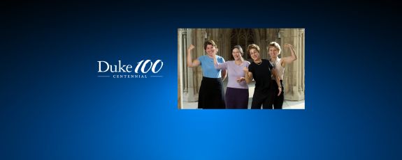 Four women flexing muscles.